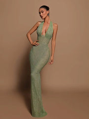 Selvara – Green sequin dress with open back and halter neckline