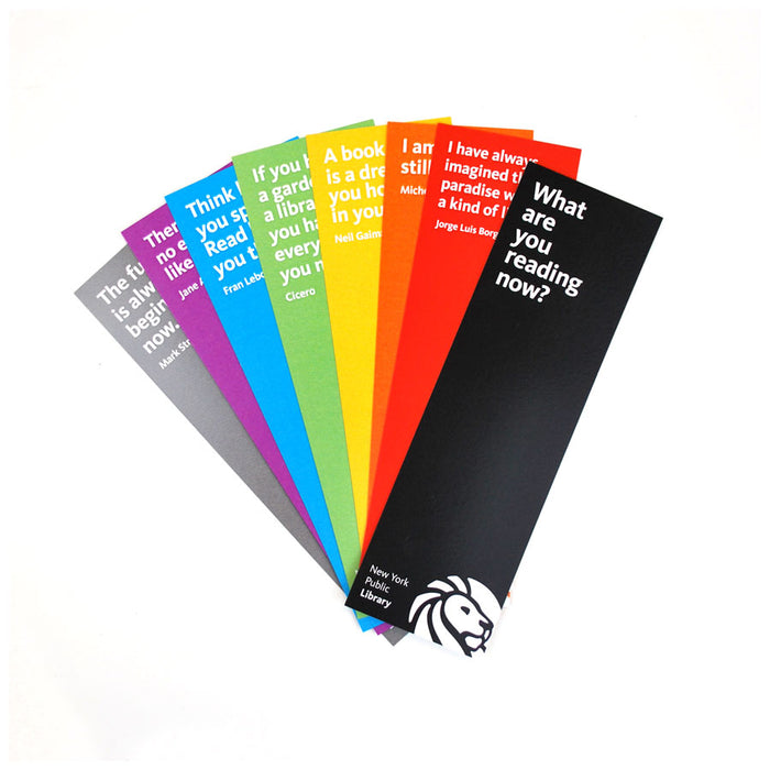 A collection of colorful paper bookmarks with quotes printed on them, fanned out on a white background.