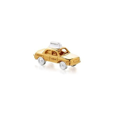 Gold vermeil taxi cab charm with silver taxi topper that reads 'New York City' and silver wheels.