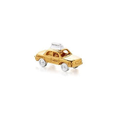 Gold vermeil taxi cab charm with silver taxi topper that reads 'New York City' and silver wheels.