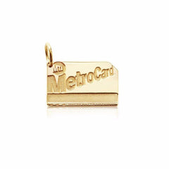 Gold rectangular MetroCard charm.