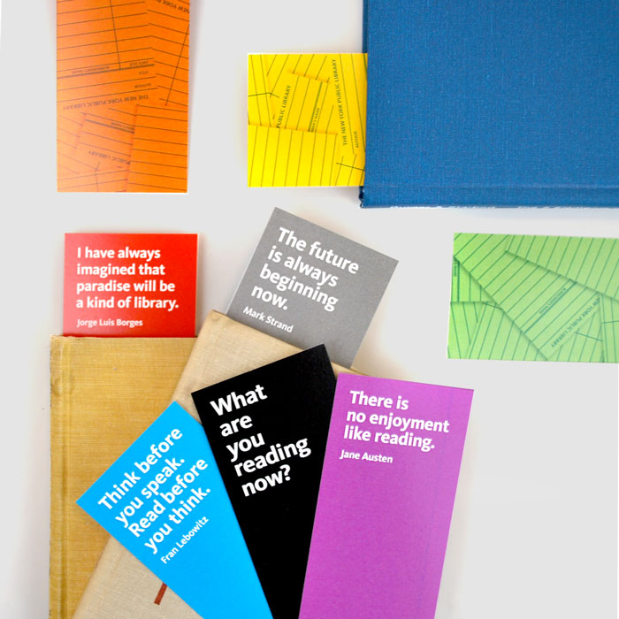 Colorful bookmarks showing the front and the back of the bookmarks placed in different directions.